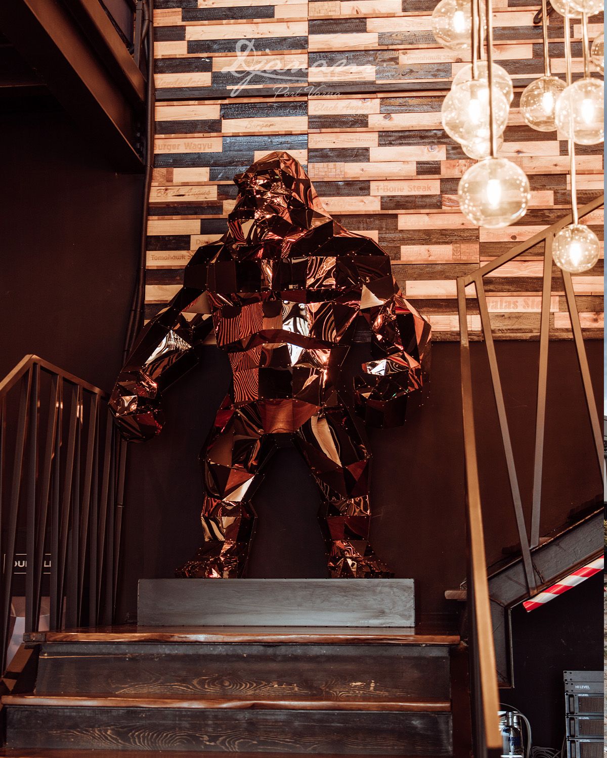 The copper gorilla by the stairs