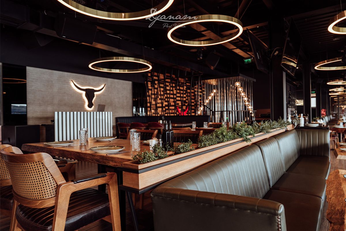 Dining beneath the bull